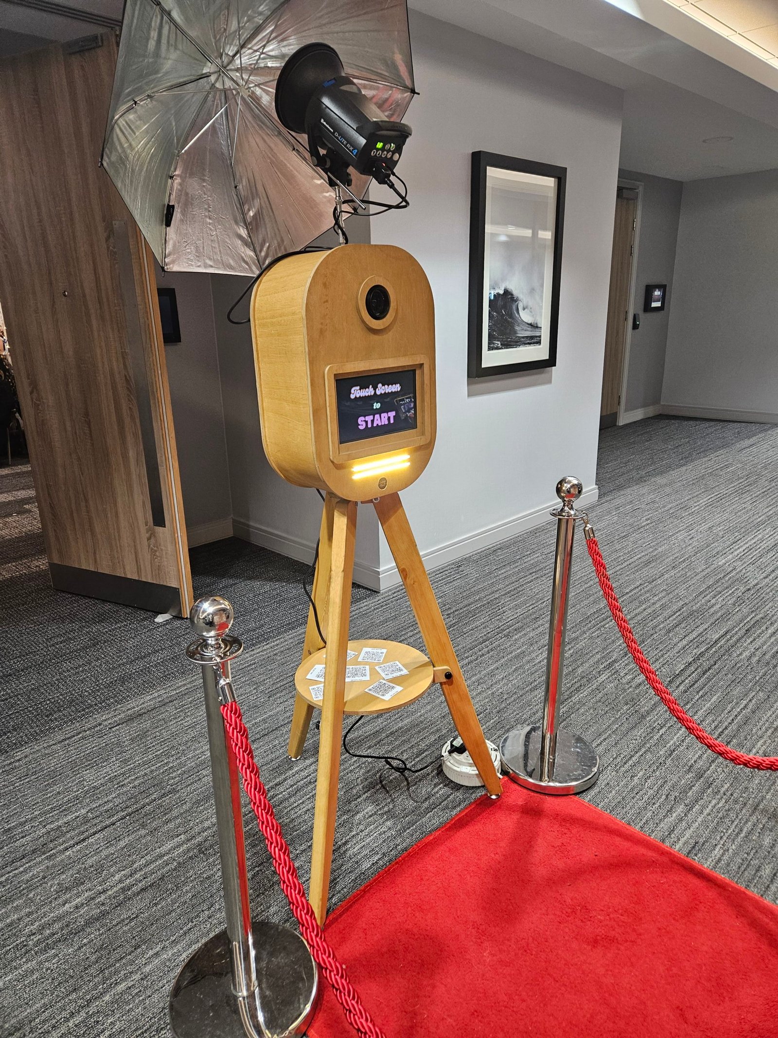 retro wooden photo booth setup with props